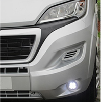 The Fiat Ducato with its daytime running lights (DRLs) on, providing added visibility for safer driving in low-light conditions.