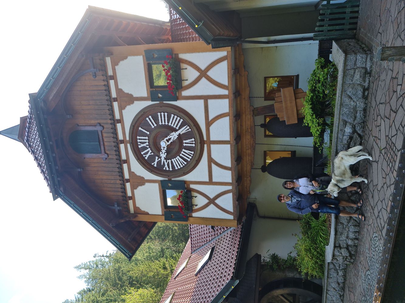 Our photo at the world's largest cuckoo clock, with the massive timepiece in the background.