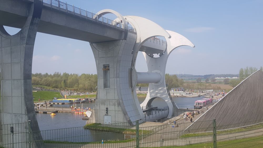 Falkirk Wheel - Iconic rotating boat lift connecting canals in Scotland.