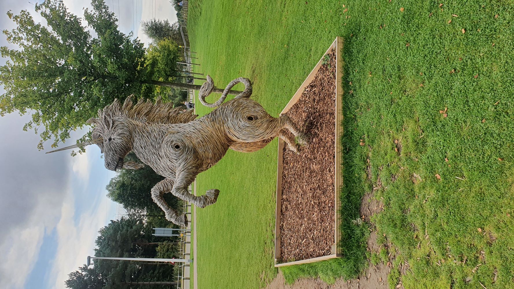 Sculpture near the Kelpies in Falkirk, Scotland, depicting mythical water horses.