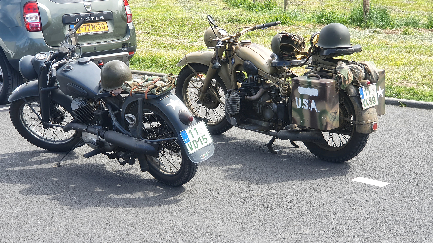 Two iconic World War II motorbikes on display at the Overlord Museum, representing the mobility and agility of Allied forces during the conflict.