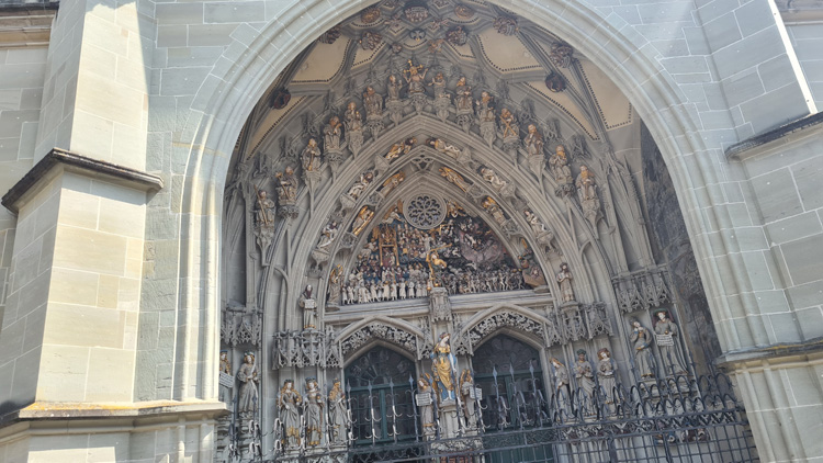 Majestic Bern Cathedral with ornate gothic details and towering spires