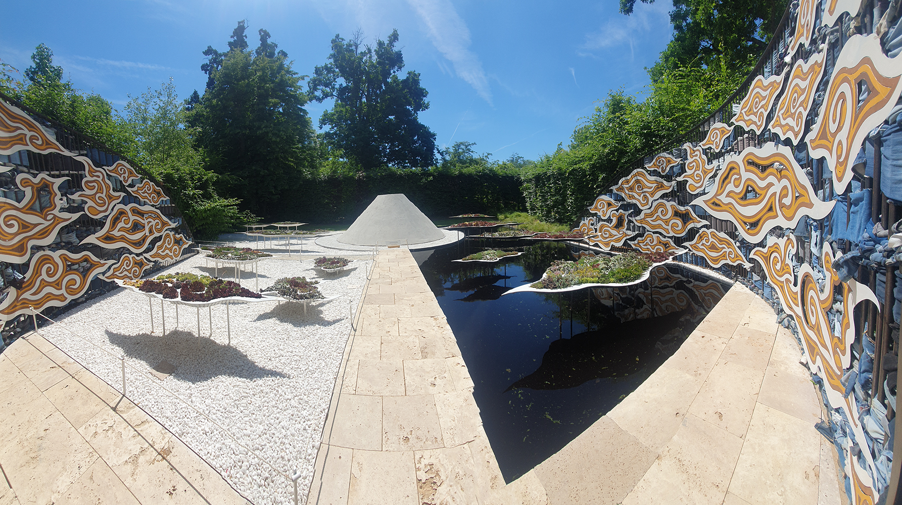 A vibrant garden display at Château de Chaumont, showcasing an array of colorful flowers and lush greenery.
