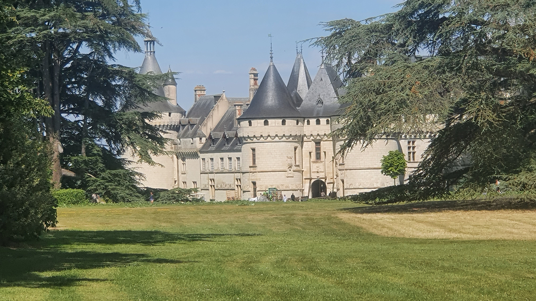 A majestic view of Château de Chaumont, with its imposing architecture set against the backdrop of lush greenery.