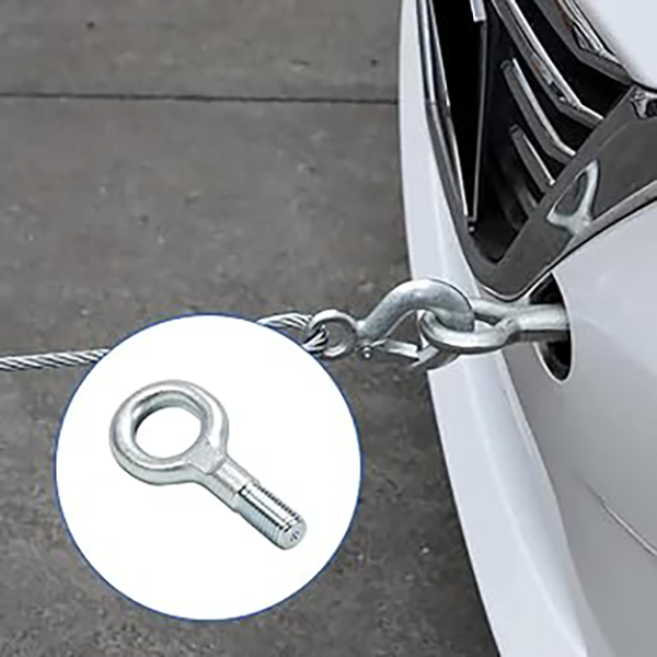 Fiat Ducato stuck in the mud, with a tow vehicle carefully pulling it out using a tow strap to prevent damage.